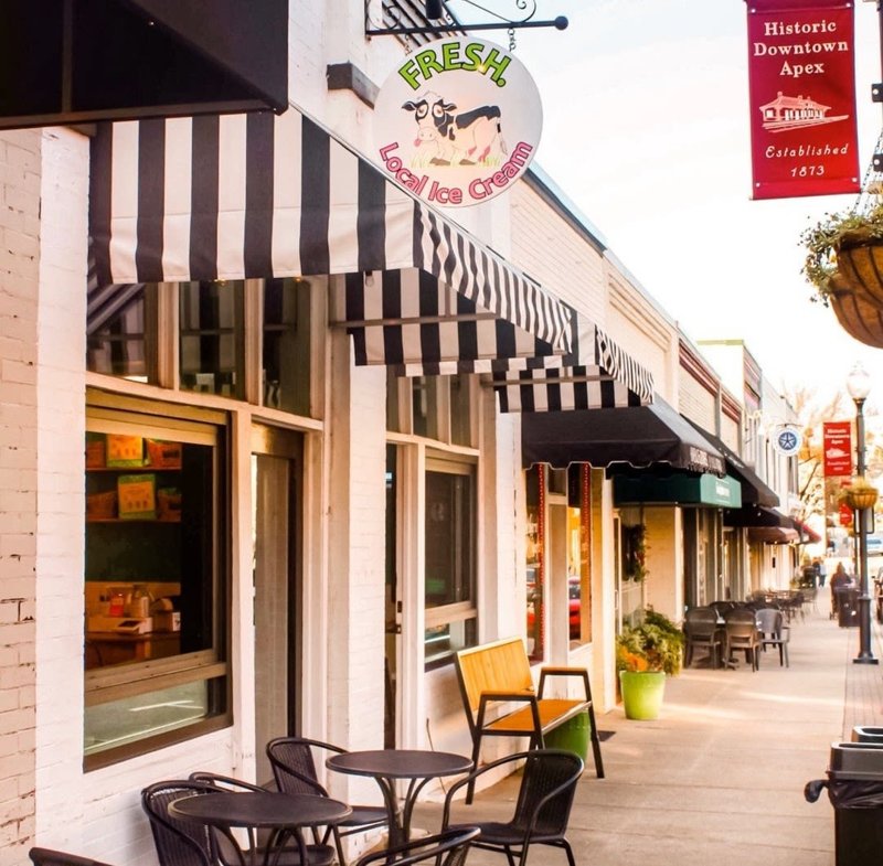 Historic downtown Apex storefronts including local ice cream shop.