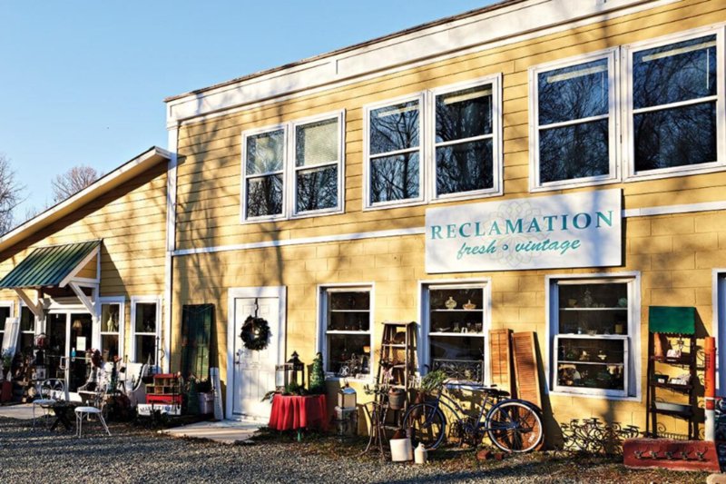Exterior of antique and vintage shopping store in Pittsboro, North Carolina with rustic decor and storefront display